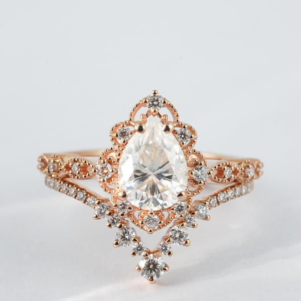 “Quantum Rose”-Luxurious Pear Shape Moissanite Rose Gold Unique Design Engagement Ring Set