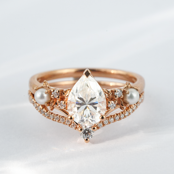“Frozen Flame”-Pear-Shaped Moissanite and Pearl Engagement Ring Set